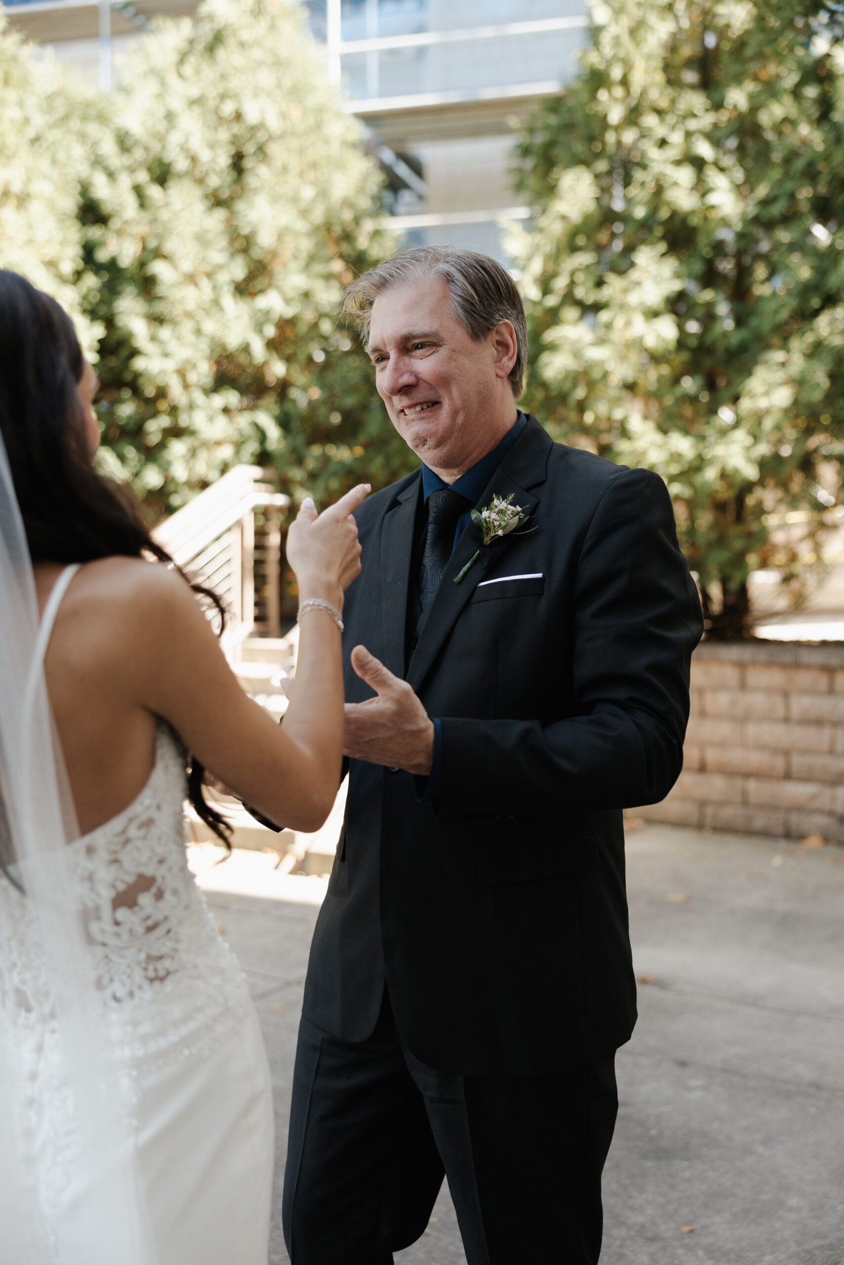 Father crying during father daughter wedding first look