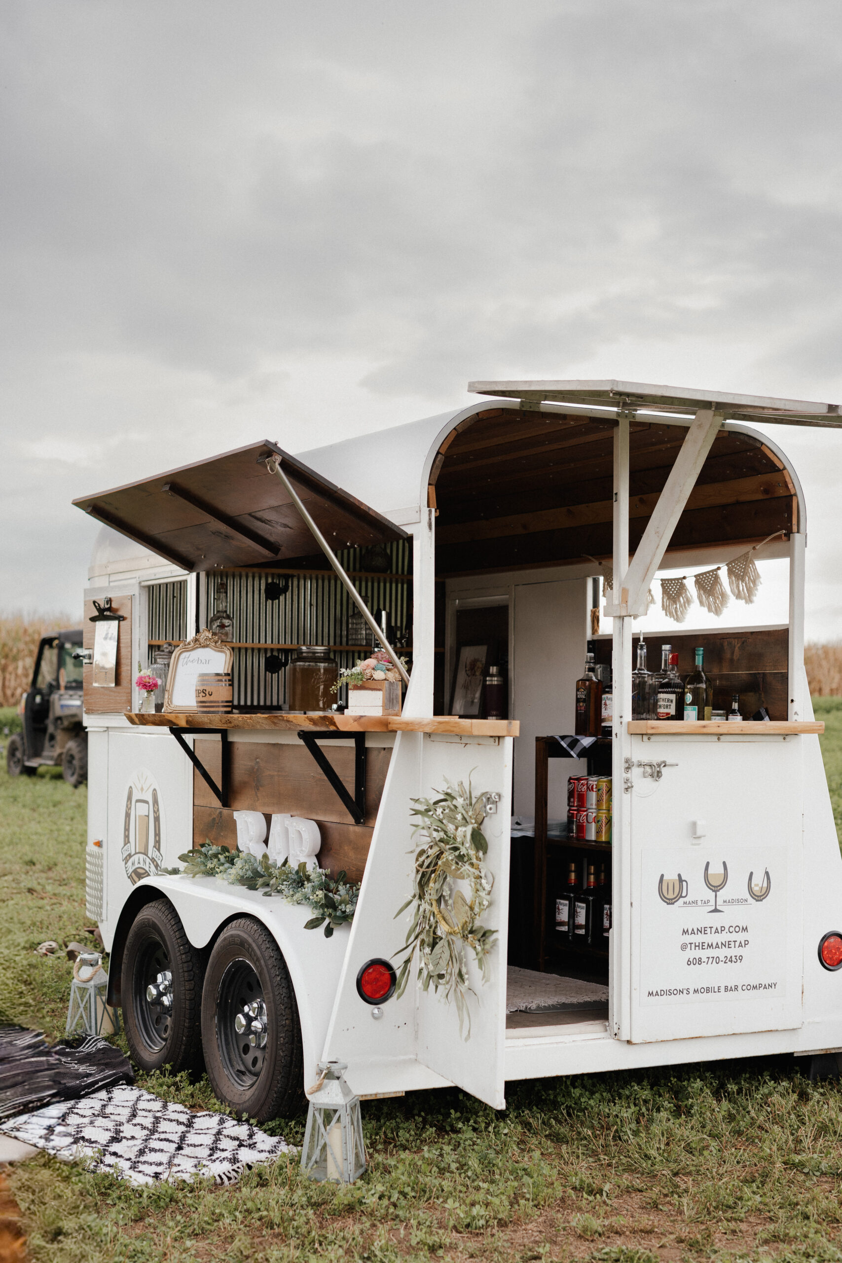 A mobile bar for a backyard wedding