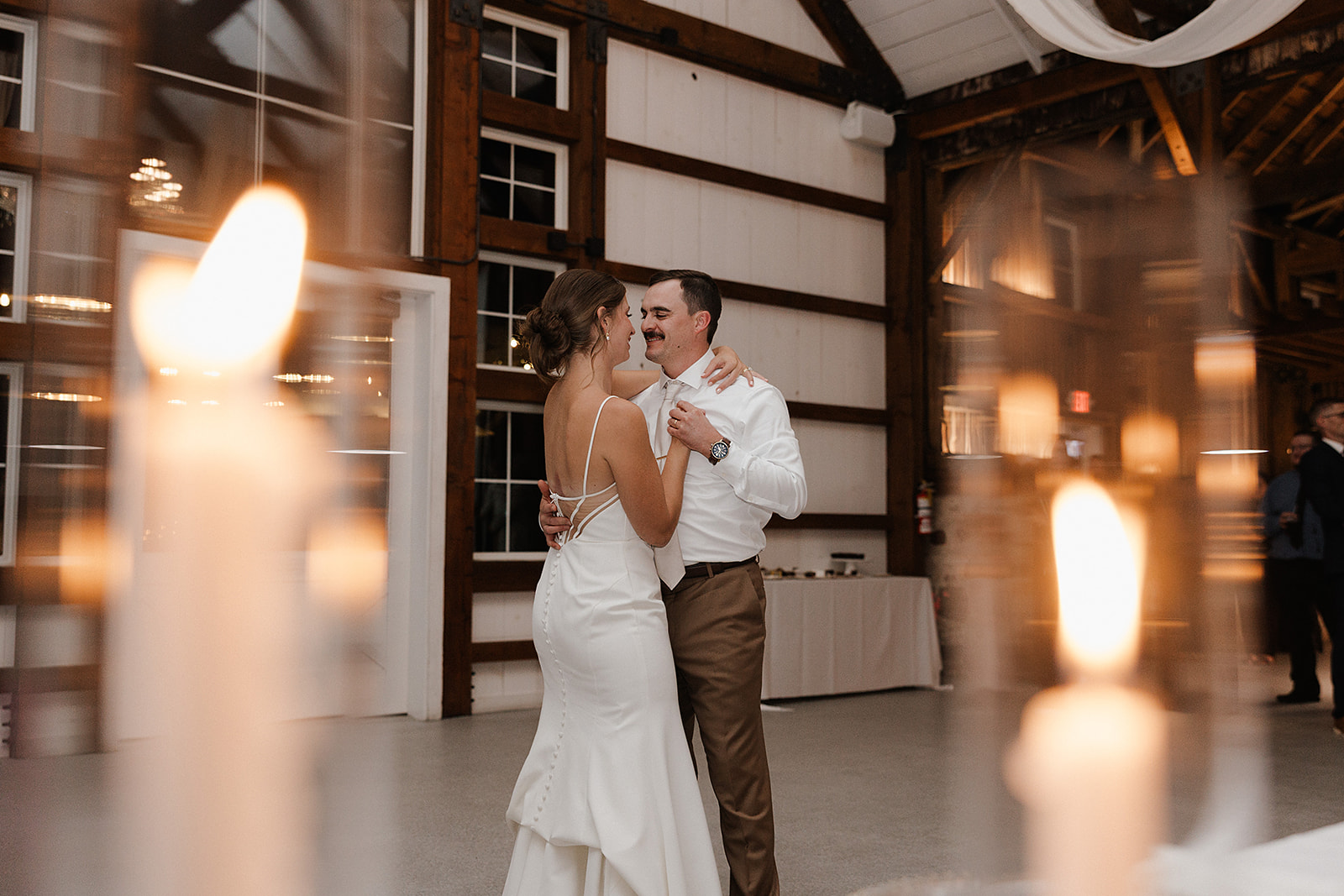 A bride and groom sharing their first dance in a photo taken by a Wisconsin wedding photographer