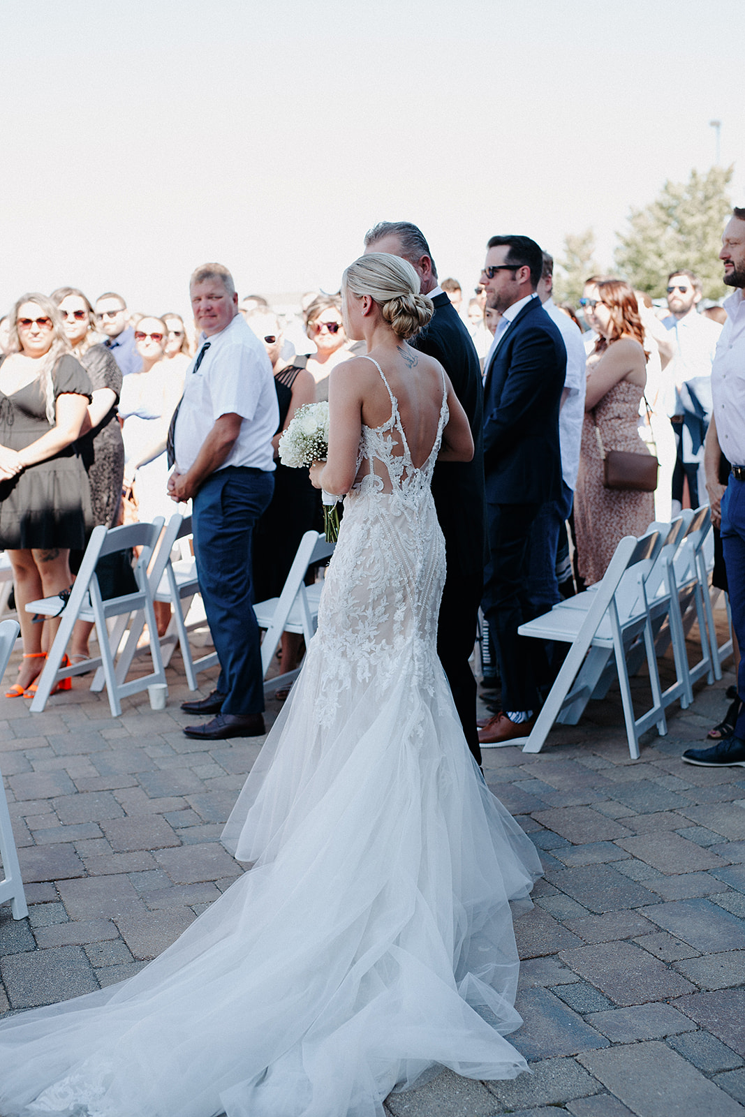 A bride walking down the aisle with her dad