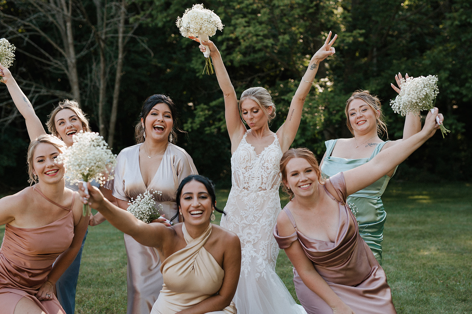 A bridal party cheering