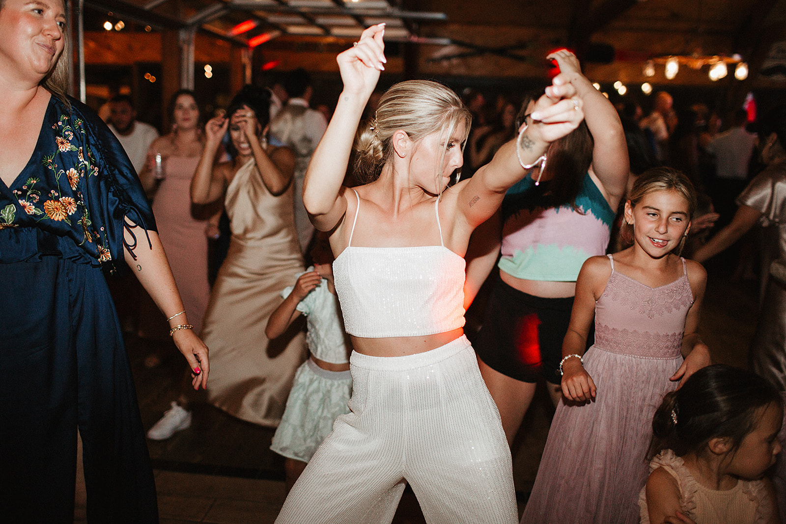 A bride dancing at her wedding reception