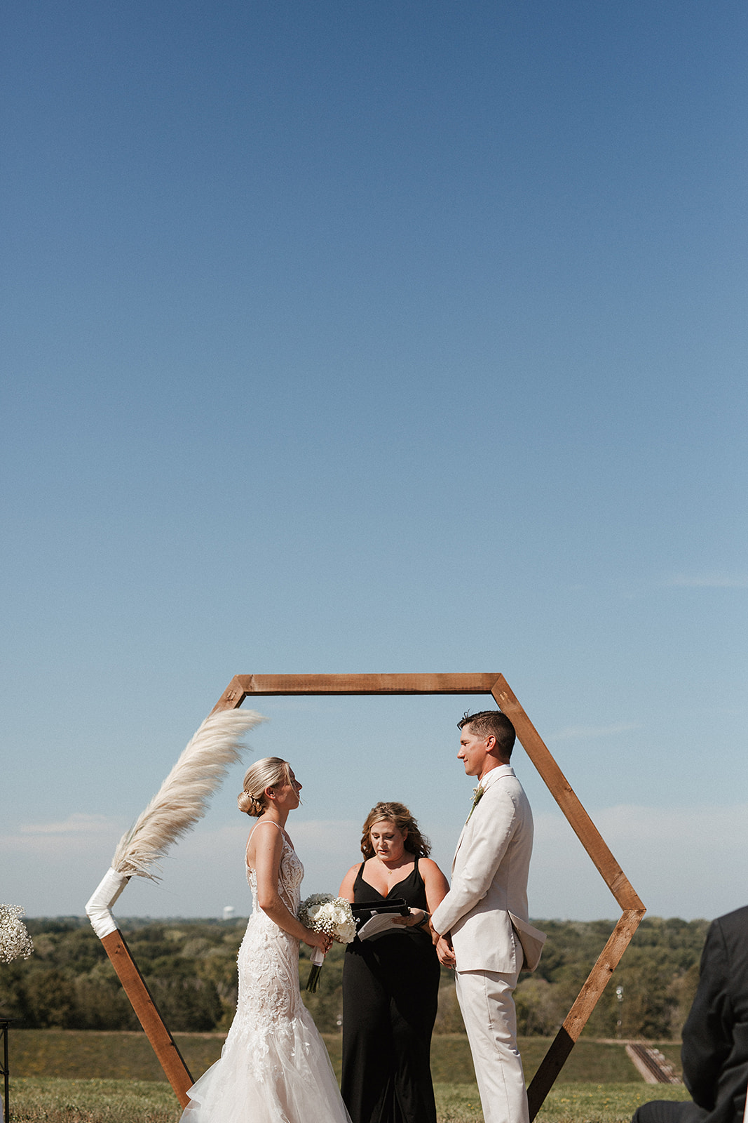 A bride and groom during their Milwaukee wedding ceremony, captured by a Milwaukee wedding photographer