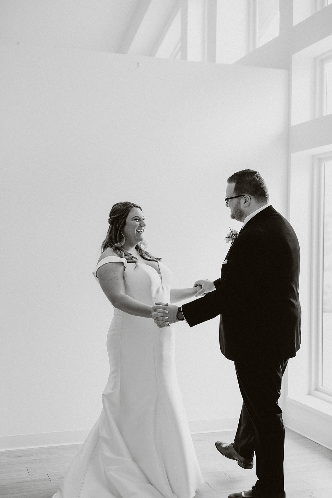 A bride and groom posing for wedding photos at the Eloise