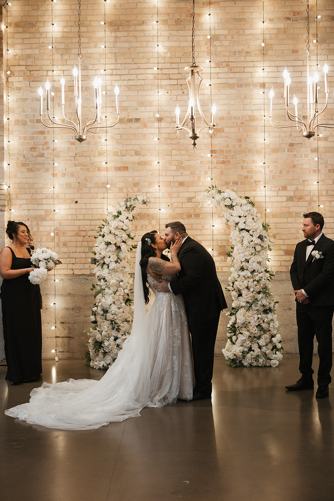 Bride and groom kiss at their Wisconsin wedding venue