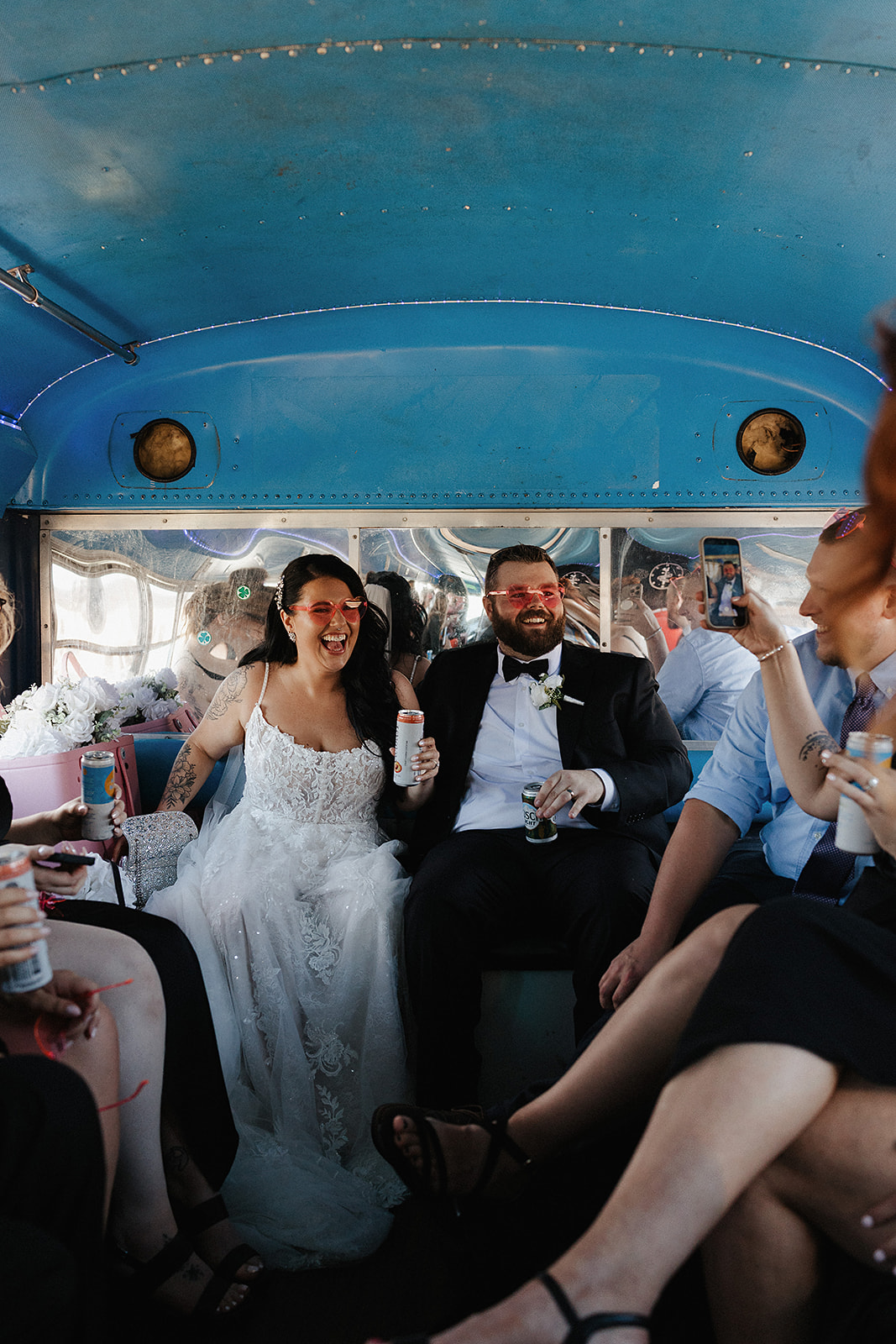 Green Bay wedding venue couple smiling on party bus together