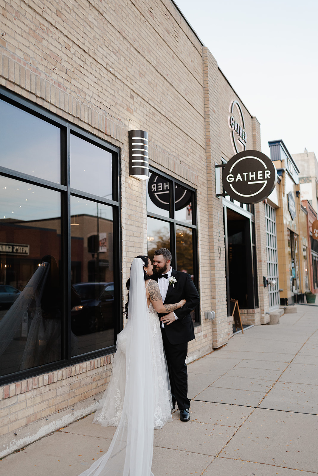 Bride and groom near Green Bay wedding venue entrance
