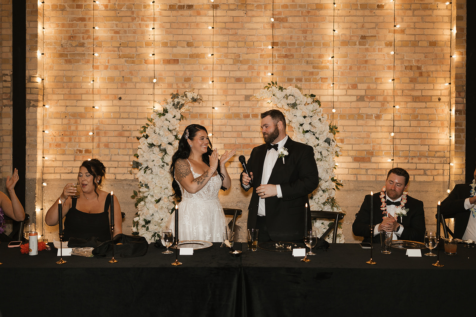 Groom speaking during reception toast