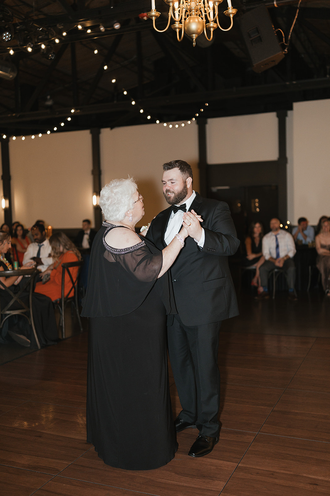 Groom dancing with his mother at the Green Bay wedding venue